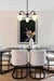 Noveua Gooseneck Glass Chandelier in black over a dining table.