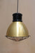 Bright brass shade with short black cover and cage
