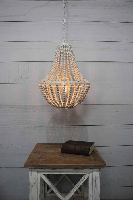 Single pendant light with vintage exposed bulb style coastal living beach house styling