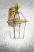 Small brass wall light with clear glass panels