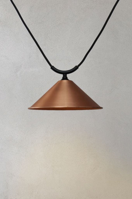 Small bright copper cone shade on trapeze pendant