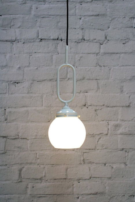 Small white pendant with bright bulb