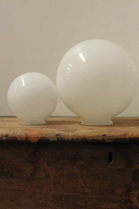 Small six inch and medium 10 inch size glass balls in opal