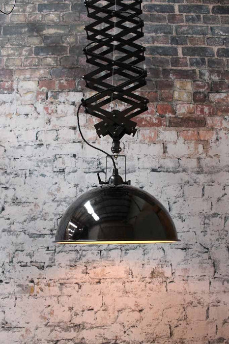 steel shade with porcelain enamel. Large black pendant light. Large scissor arm. Use over tables or in bars and cafe lighting fitouts.