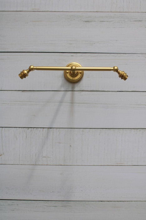 B22 double arm light gold finish in tilted position