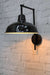 Warehouse wall light with black arm and black shade