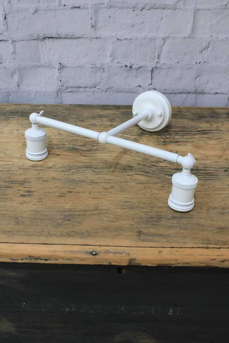 White steel double arm wall sconce