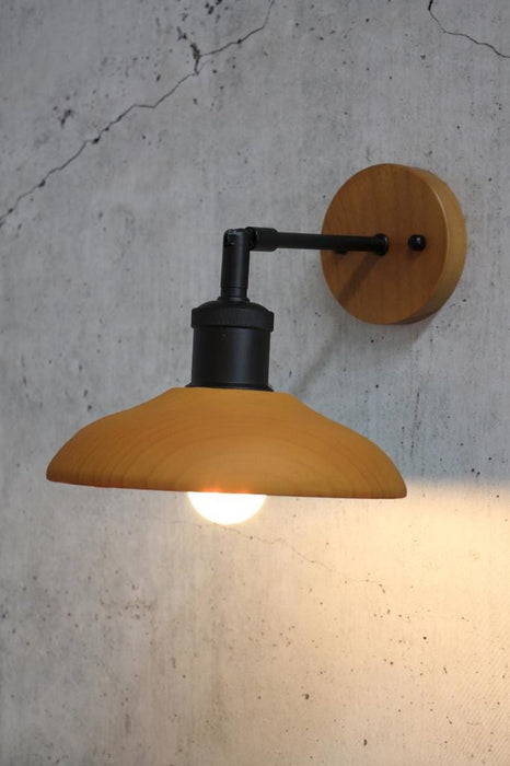 wooden wall light with matt black arm