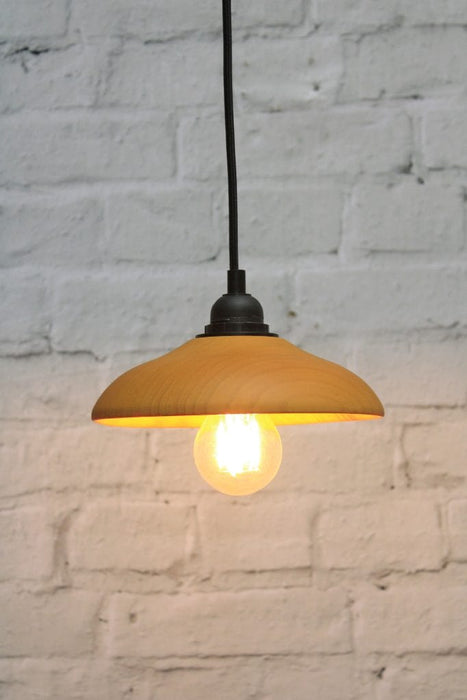 Small wooden shade with black cord